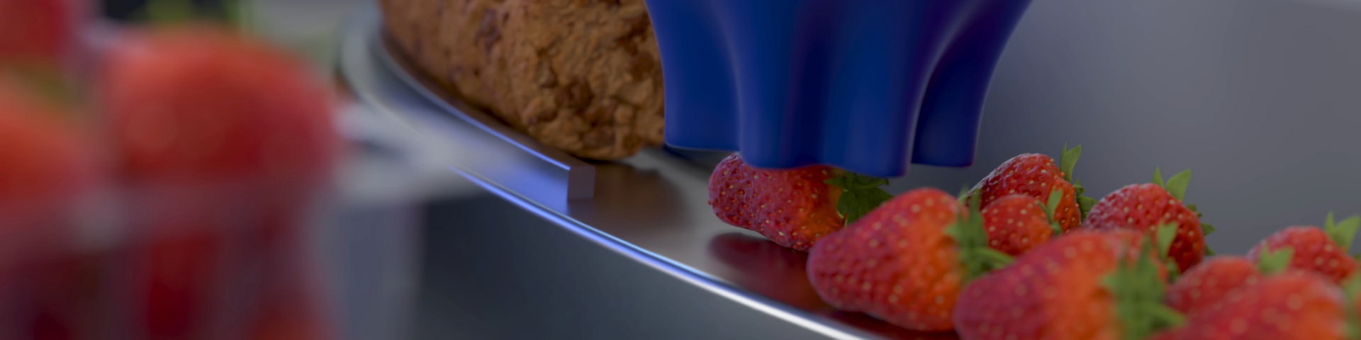 OnRobot soft grippers holding a strawberry